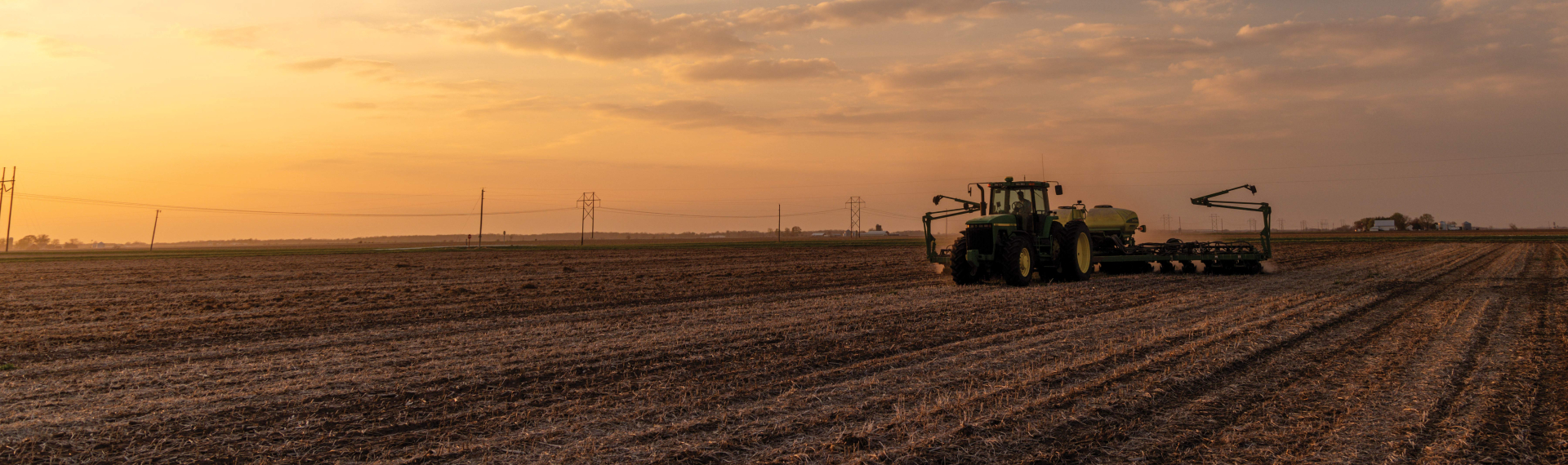 Planter planting corn.